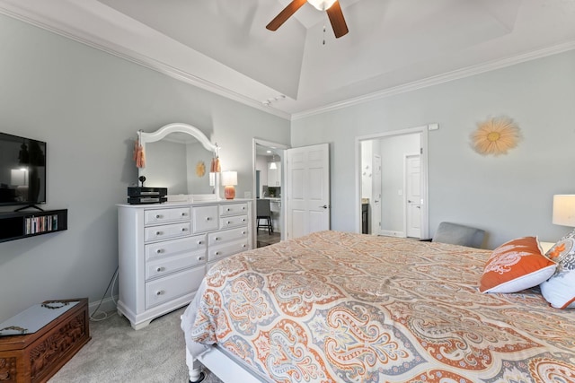 bedroom featuring connected bathroom, light colored carpet, ceiling fan, and crown molding