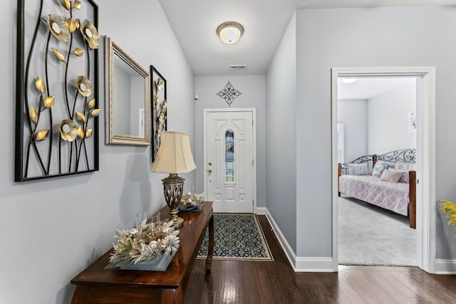 foyer with hardwood / wood-style flooring