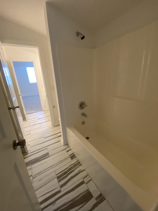 bathroom featuring shower / tub combination