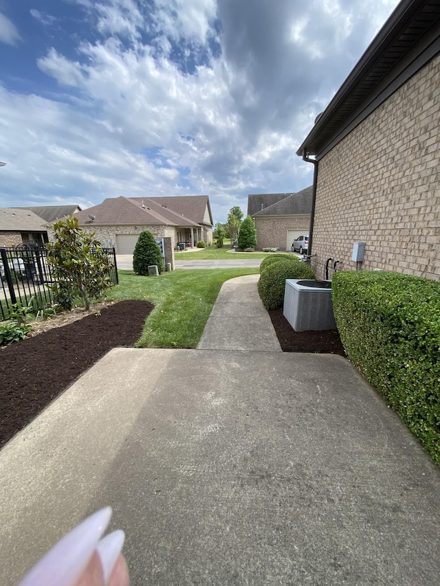 view of yard with a garage