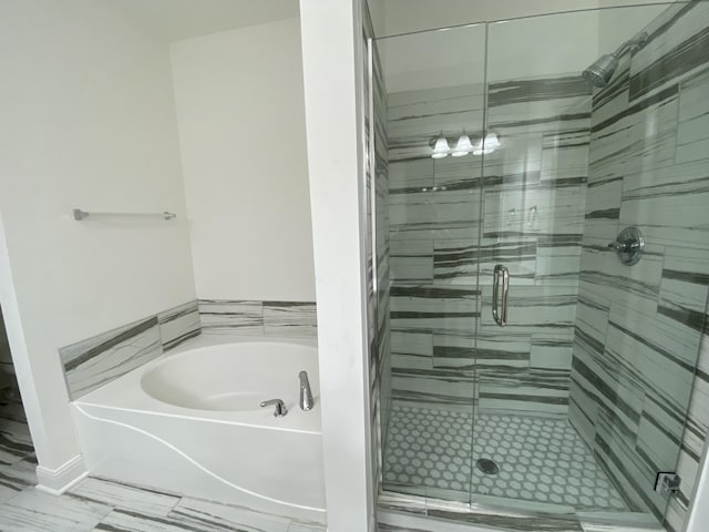 bathroom with independent shower and bath