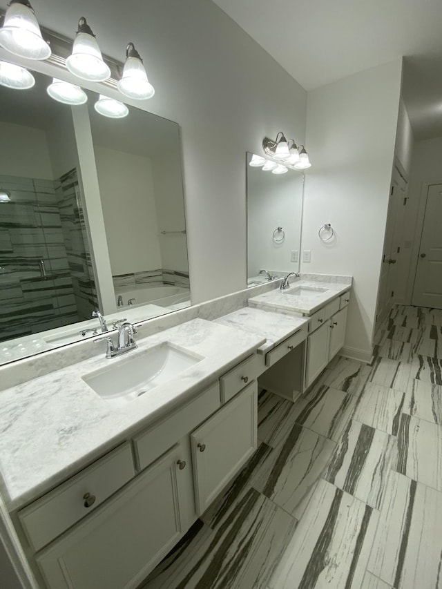 bathroom featuring vanity and shower with separate bathtub