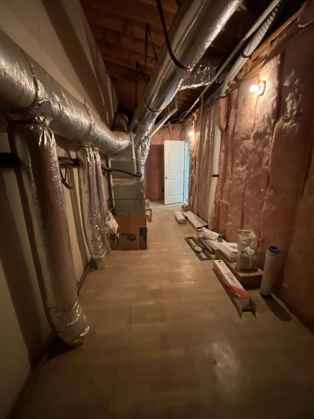 basement featuring heating unit