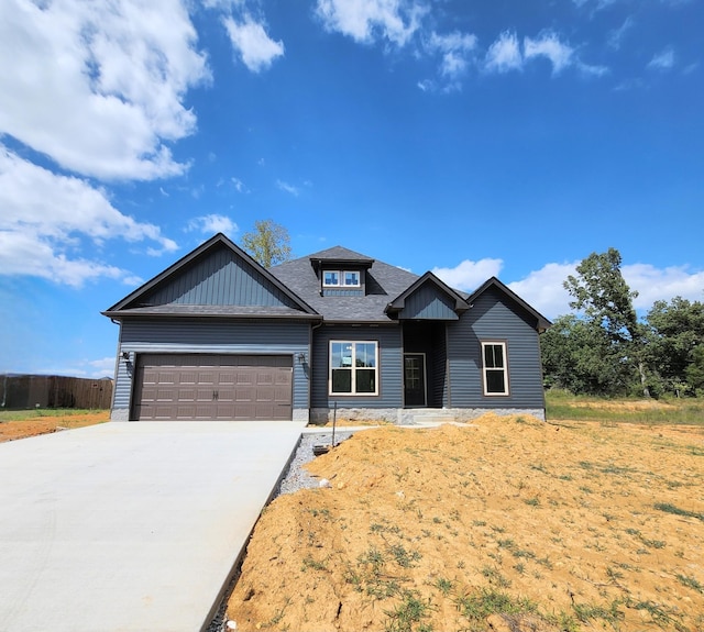 craftsman inspired home with a garage