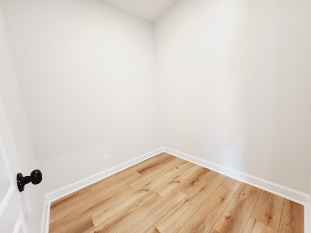 unfurnished room featuring wood-type flooring