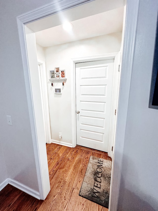 doorway to outside featuring hardwood / wood-style flooring