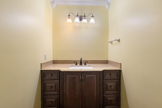 bathroom featuring vanity and crown molding