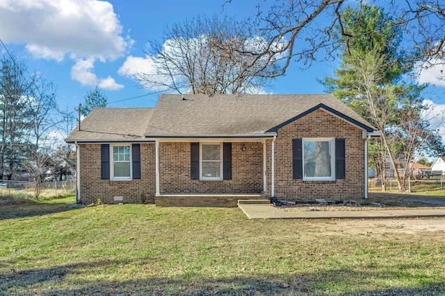 view of front of home featuring a front yard