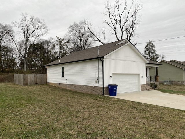 view of property exterior with a garage and a lawn