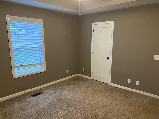 spare room with carpet flooring