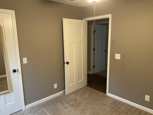 unfurnished bedroom featuring carpet floors