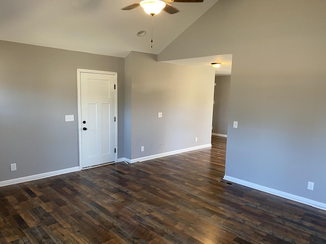 unfurnished room featuring dark wood-type flooring, ceiling fan, and high vaulted ceiling