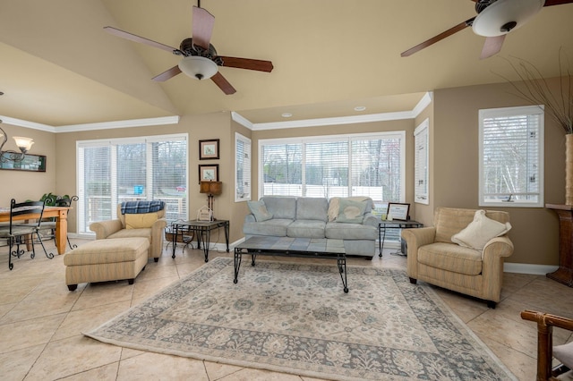 living room featuring ceiling fan with notable chandelier, ornamental molding, and light tile patterned floors