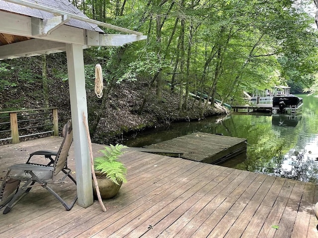 view of dock with a water view