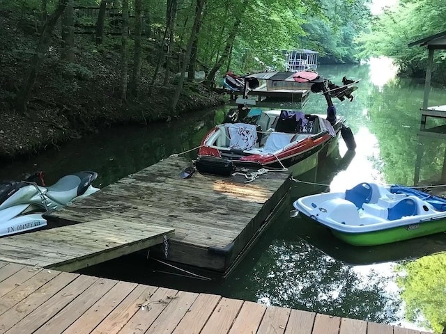 view of dock with a water view