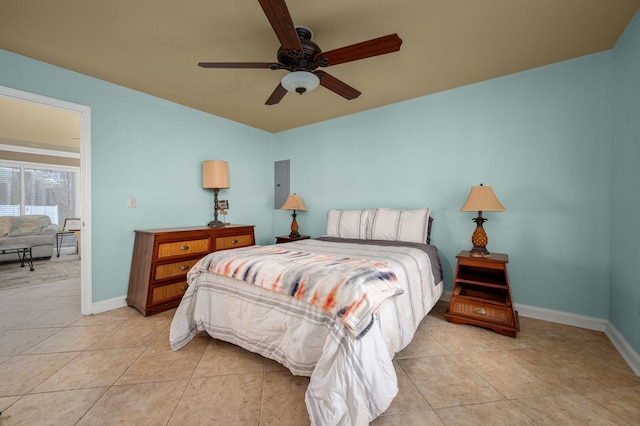 bedroom with ceiling fan and light tile patterned floors