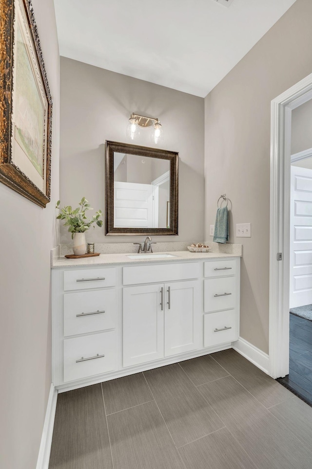 bathroom with vanity and tile patterned floors