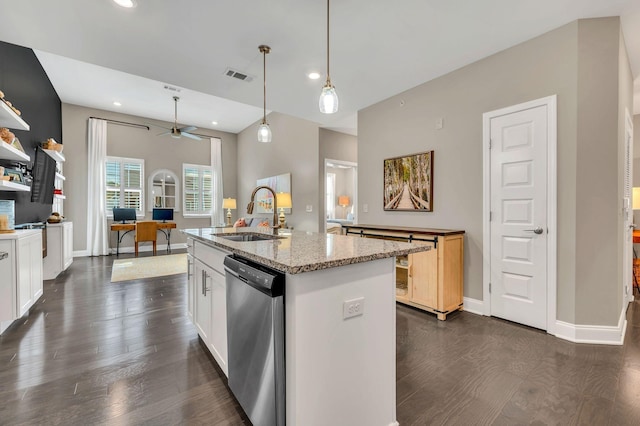 kitchen featuring dishwasher, an island with sink, dark wood-type flooring, and sink