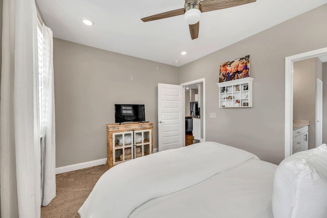 carpeted bedroom with ceiling fan