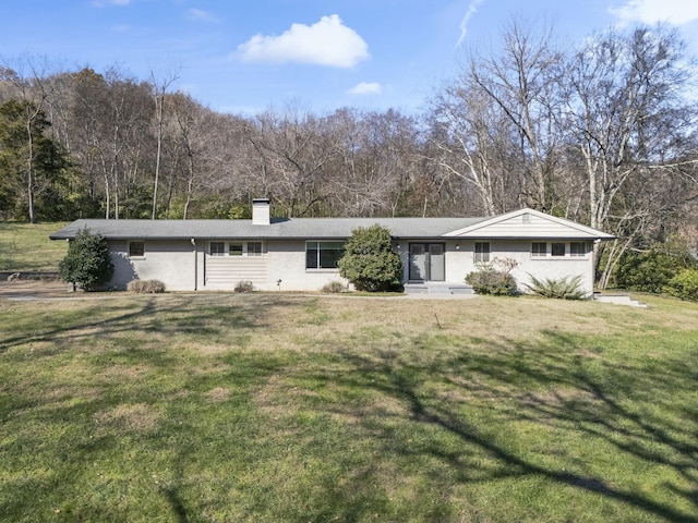 single story home with a front yard