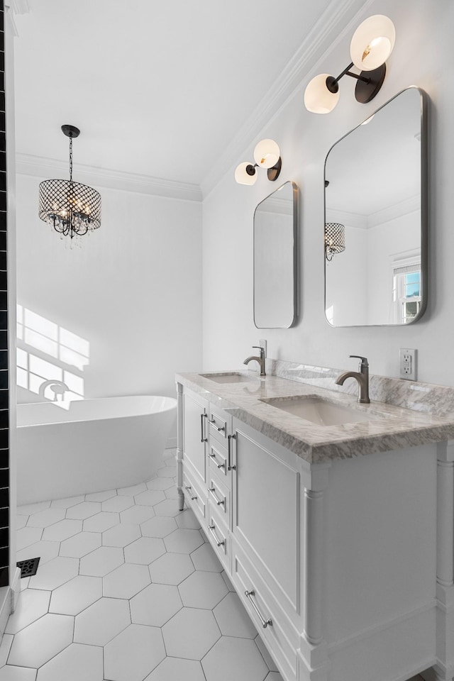 bathroom featuring ornamental molding, a tub, and vanity