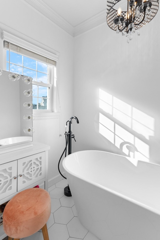 bathroom with ornamental molding, tile patterned flooring, vanity, and a washtub