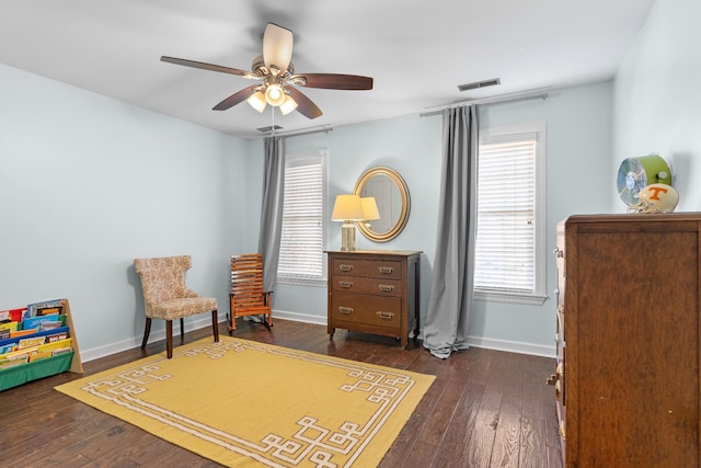 bedroom featuring dark wood-type flooring and ceiling fan