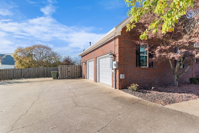 view of property exterior with a garage