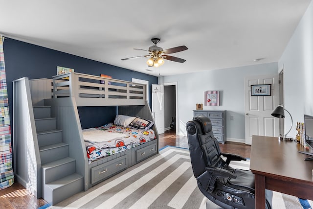 bedroom with light wood-type flooring and ceiling fan