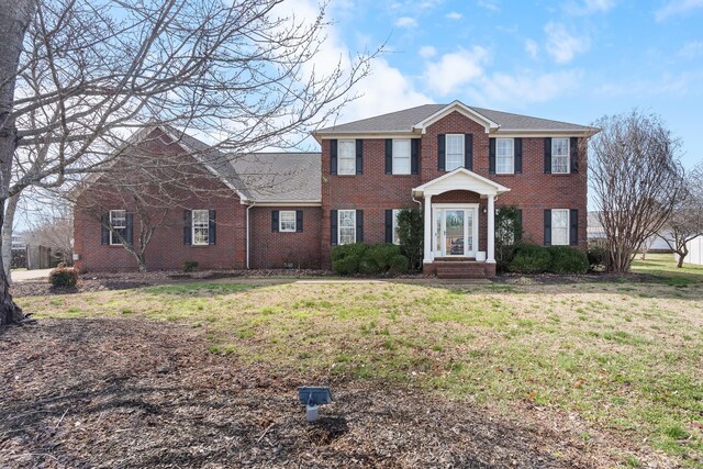 colonial house with a front lawn