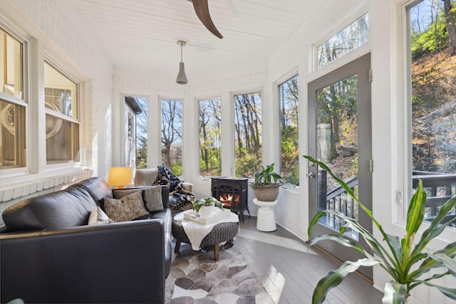 sunroom / solarium with ceiling fan