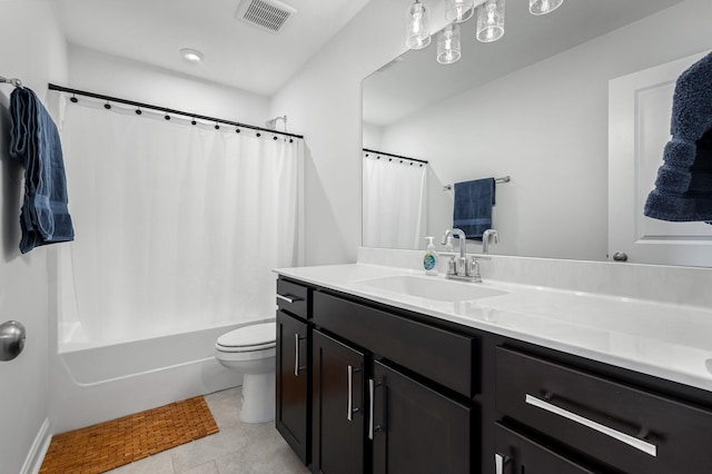 full bathroom featuring tile patterned floors, shower / tub combo with curtain, vanity, and toilet