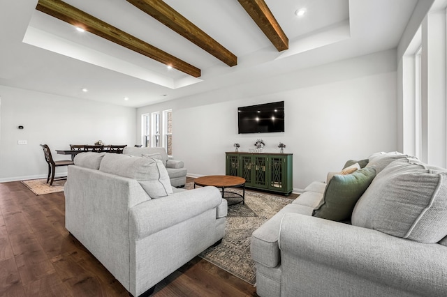 living room with beam ceiling and dark hardwood / wood-style floors