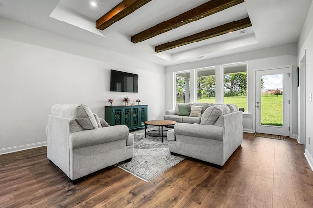 living room with beamed ceiling and dark wood-type flooring