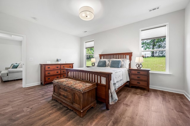 bedroom featuring dark wood-type flooring