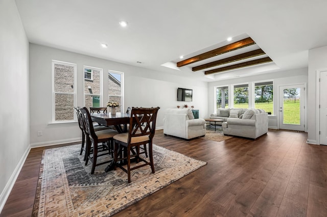 dining space with beamed ceiling and dark wood-type flooring