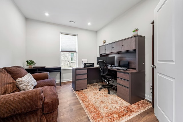 office area featuring light wood-type flooring