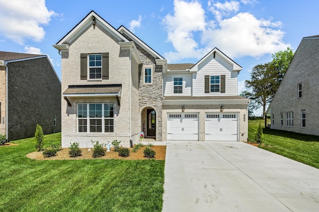 craftsman house with a front yard and a garage