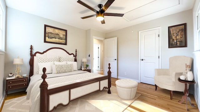 bedroom featuring light hardwood / wood-style flooring and ceiling fan