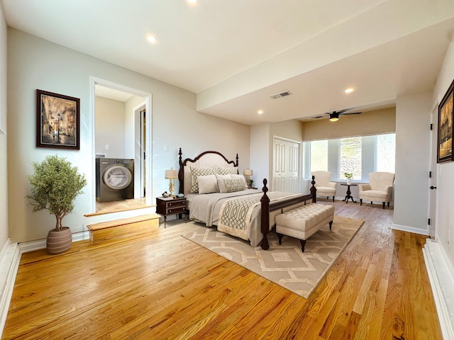 bedroom featuring light wood-type flooring and a closet