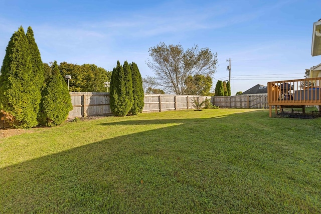 view of yard featuring a deck