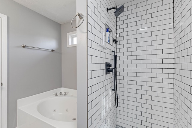 bathroom with a textured ceiling and independent shower and bath