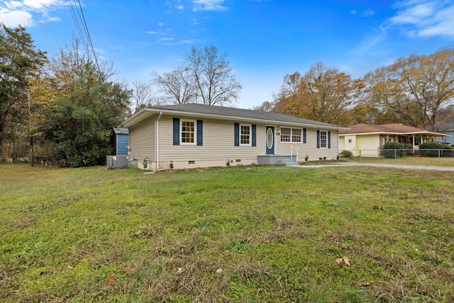 single story home featuring a front lawn