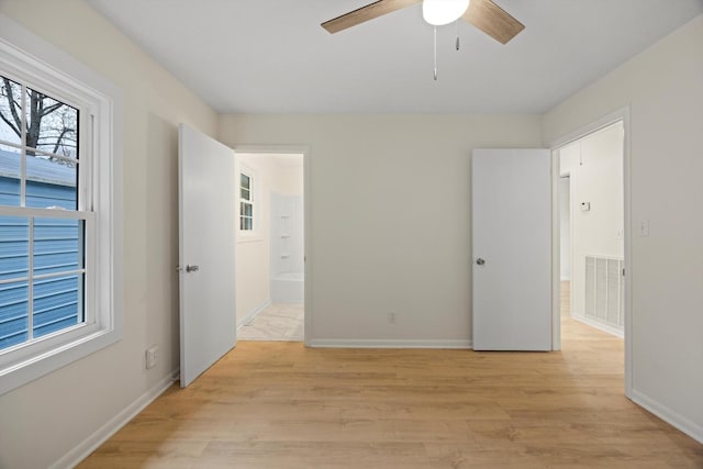 spare room with ceiling fan and light hardwood / wood-style floors