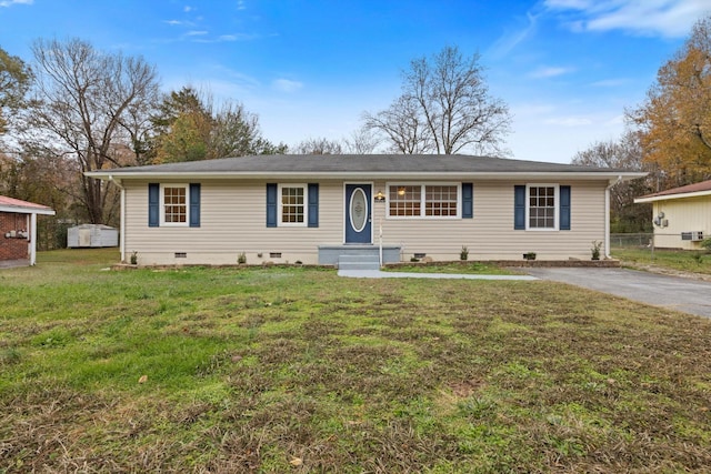 single story home with a front lawn