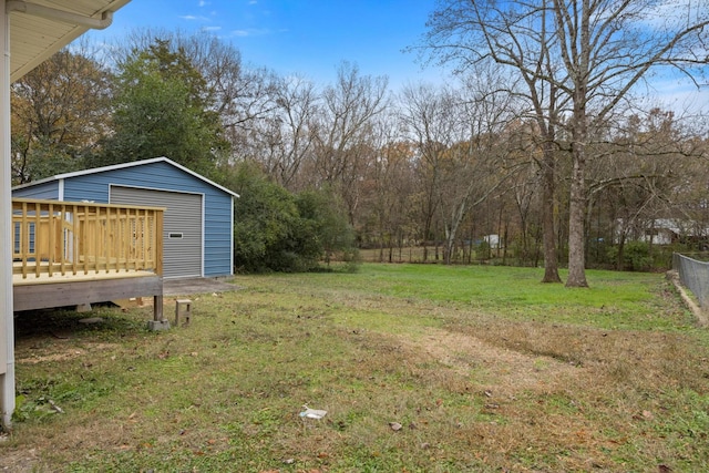 view of yard with a wooden deck