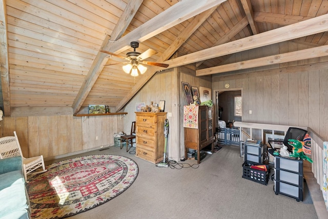 interior space featuring lofted ceiling with beams, carpet floors, wood walls, and wood ceiling