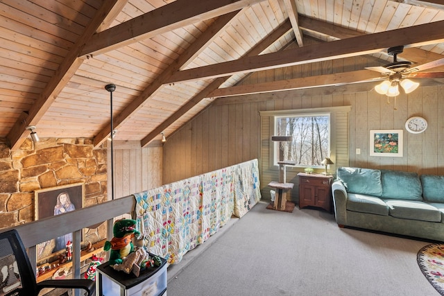 carpeted living room with wooden walls and wood ceiling