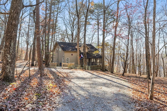 view of front of house with a sunroom