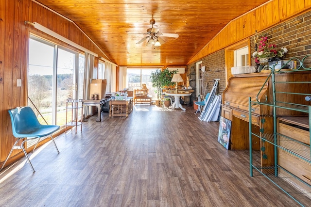 sunroom / solarium featuring ceiling fan and wooden ceiling